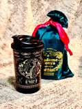 Gilded Heritage Coffee Tumbler black stainless steel with gold phoenix and peony motif, shown with teal and red decorative pouch